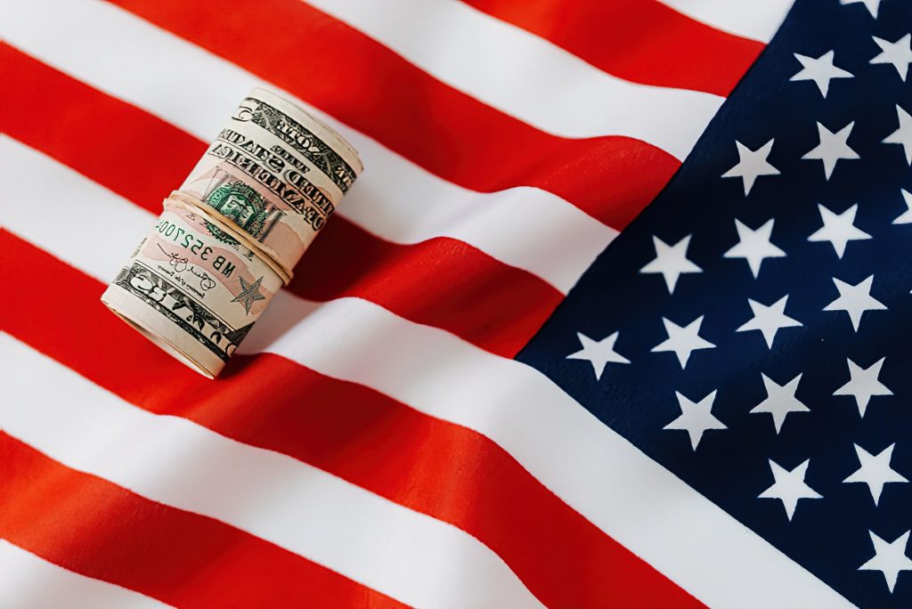 US Flag and Dollar Bill